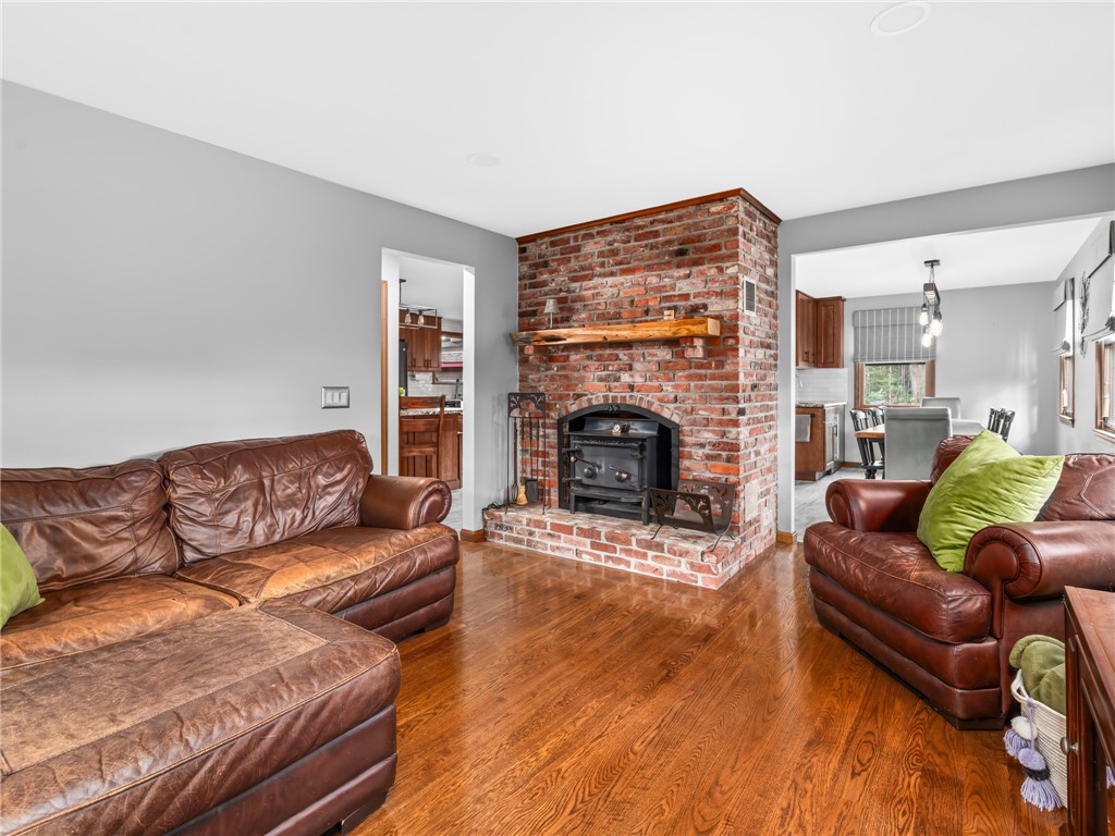 536 Douglas Hook Road Glocester, RI 02814 - Photo 7 of 42 Living room with brick hearth