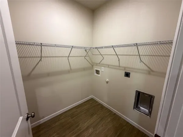 a view of a room with racks on the wall
