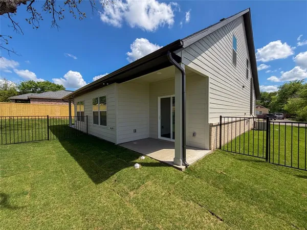 a view of a backyard with a garden