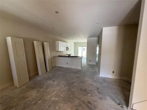 a view of a kitchen with refrigerator and yard
