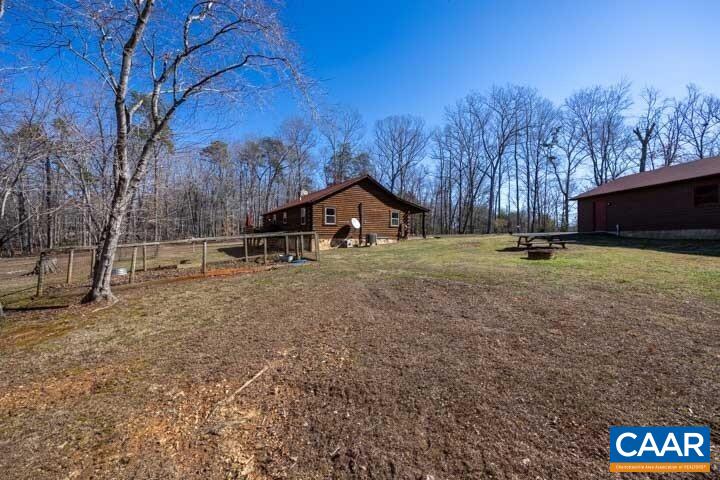 5880 Mechunk Ridge Lane Keswick, VA 22947 - Photo 36 of 38 a view of open space with trees in the background
