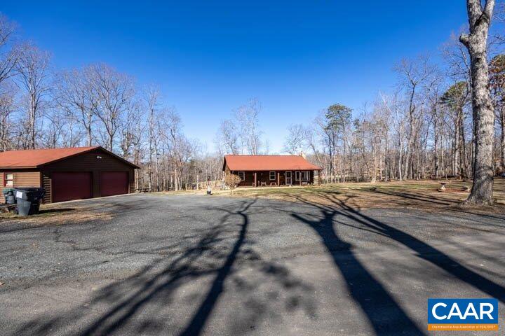 5880 Mechunk Ridge Lane Keswick, VA 22947 - Photo 37 of 38 a view of a street with a building in the background