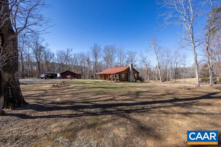 5880 Mechunk Ridge Lane Keswick, VA 22947 - Photo 7 of 38 a view of road with trees