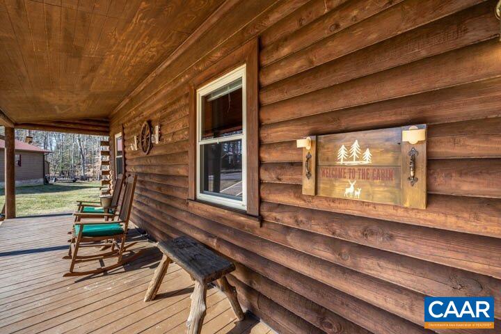 5880 Mechunk Ridge Lane Keswick, VA 22947 - Photo 9 of 38 a view of a two chairs in the roof deck