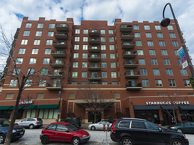 515 Main Street, Unit 707 Evanston, IL 60202 - Photo 1 of 12 a view of a car parked in front of a building