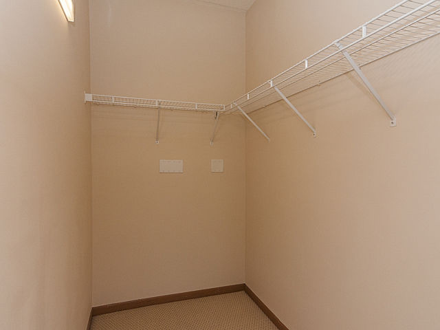515 Main Street, Unit 707 Evanston, IL 60202 - Photo 10 of 12 a view of a room with racks on the wall