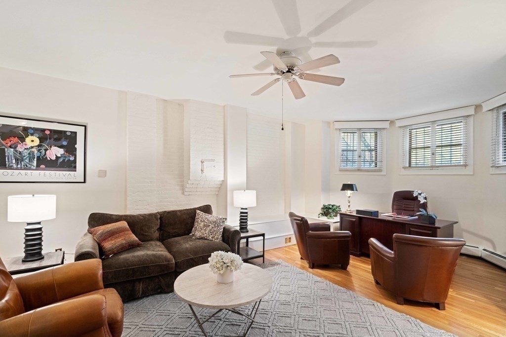 226 Commonwealth Avenue, Unit 1 Boston, MA 02116 - Photo 11 of 17 a living room with furniture wooden floor and window