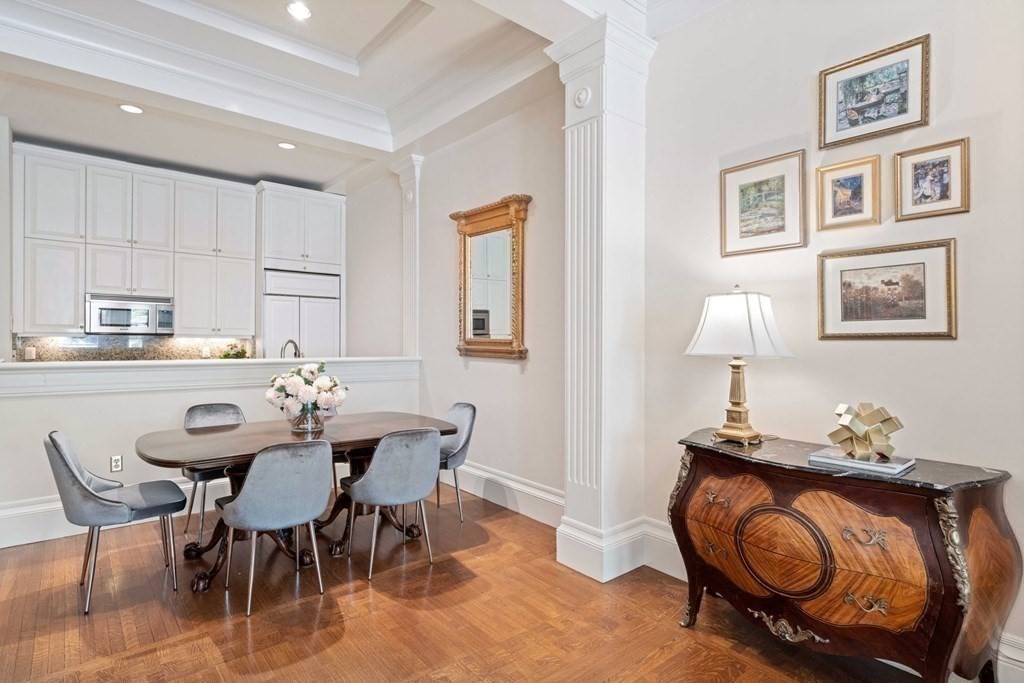 226 Commonwealth Avenue, Unit 1 Boston, MA 02116 - Photo 4 of 17 a view of a dining room with furniture