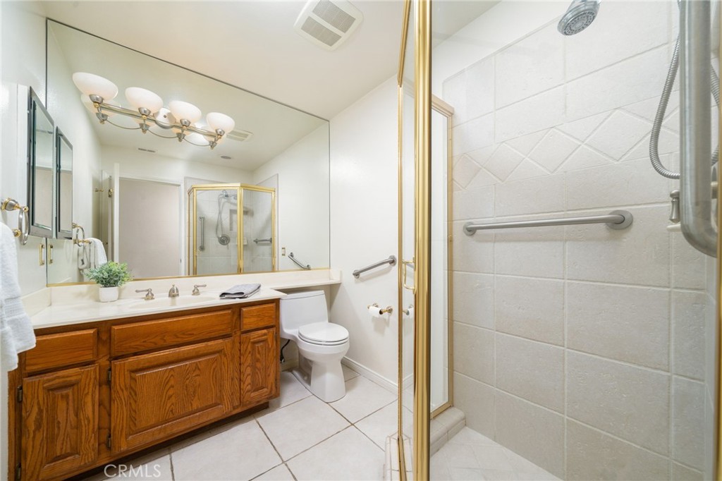 112 Morgan Ranch Road Glendora, CA 91741 - Photo 18 of 58 a bathroom with a double vanity sink mirror and toilet