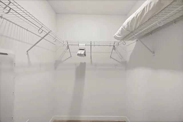 a bathroom with a sink a toilet and shower curtain