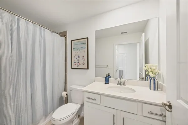 a swimming pool with outdoor seating and yard