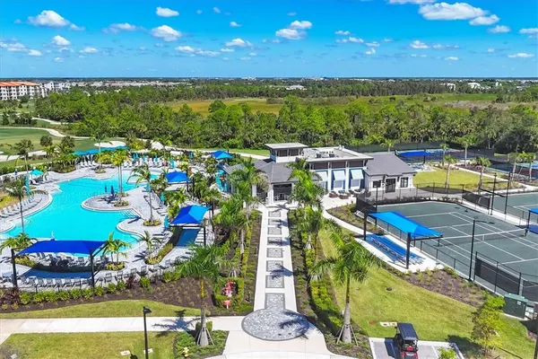 a view of a chairs and table in patio