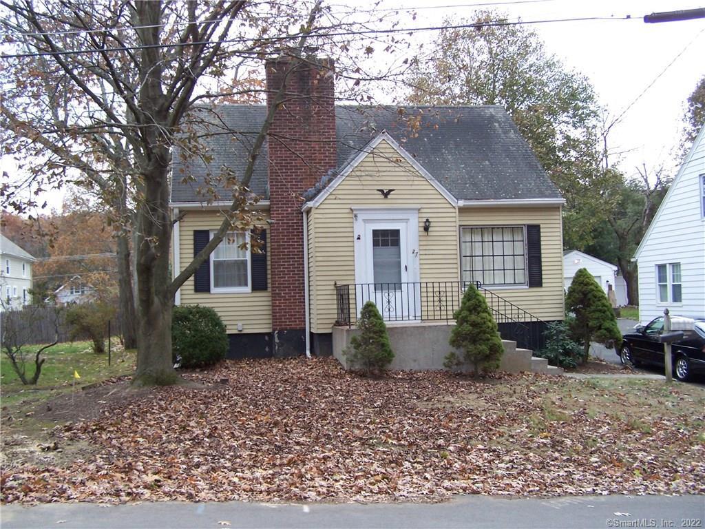 27 Evergreen Street Waterbury, CT 06708 - Photo 1 of 1 a front view of a house with garden