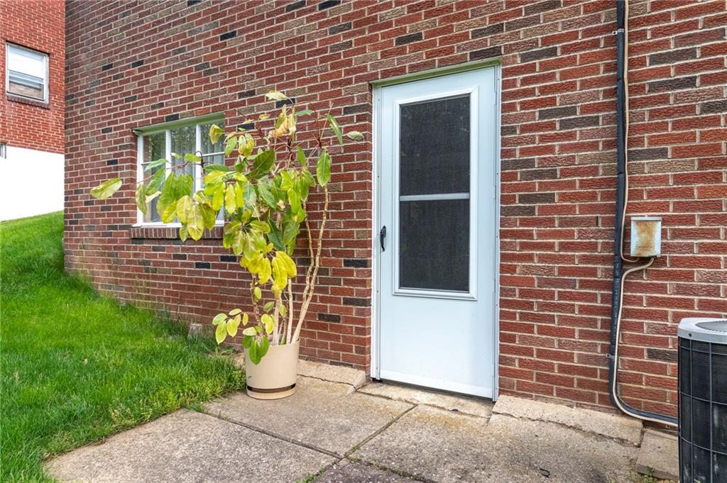 146 Ridgeview Drive Aliquippa, PA 15001 - Photo 17 of 20 Walkout from the basement to a nice private back yard. Great for some much needed downtime!
