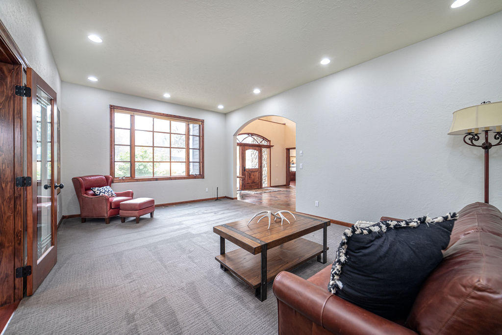 60675 Billadeau Road Bend, OR 97702 - Photo 48 of 87 a living room with furniture and a window