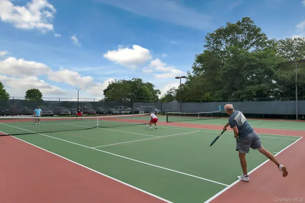 a tennis court that has tennis net