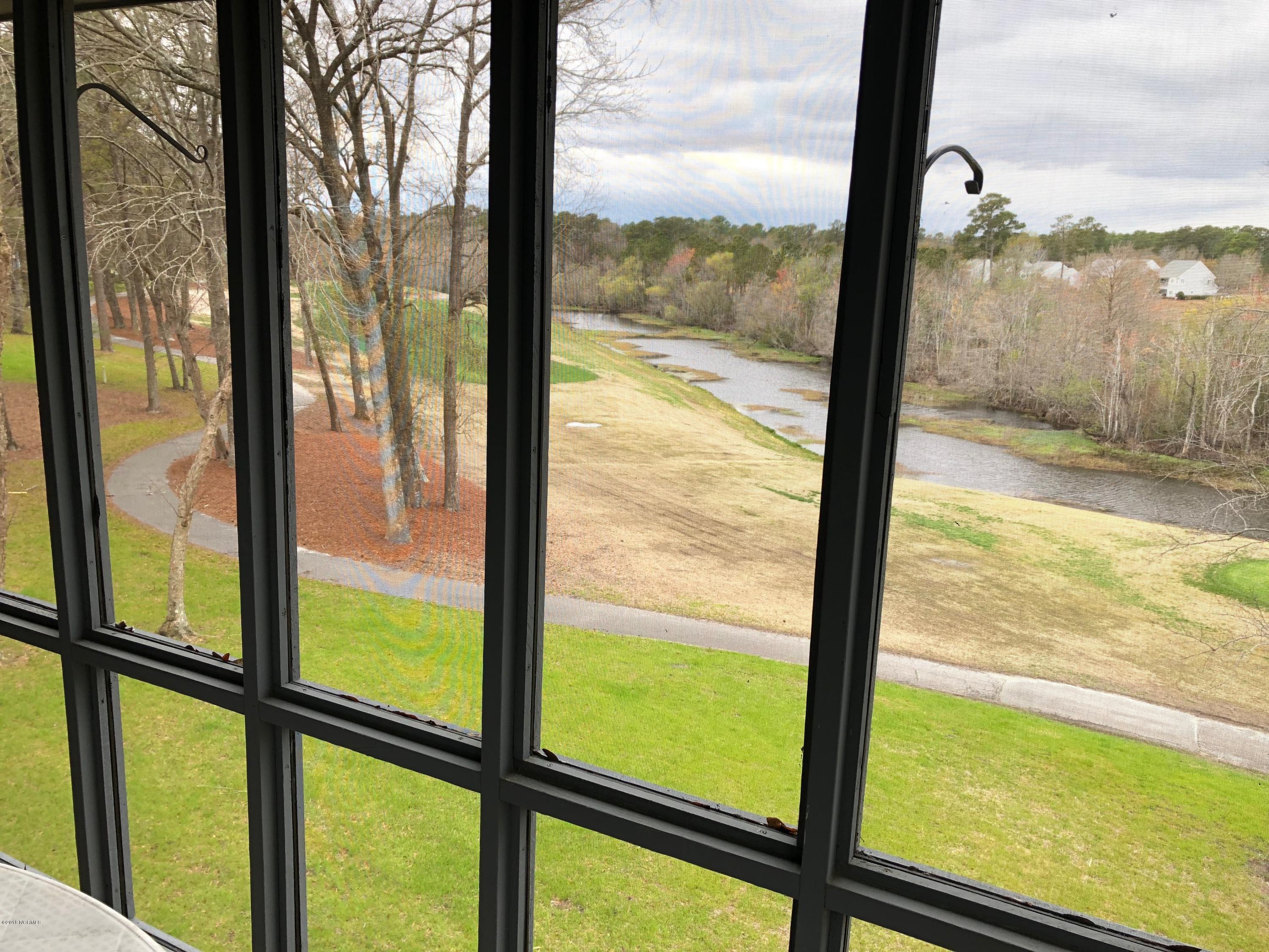 215 Clubhouse Road, Unit 206 Sunset Beach, NC 28468 - Photo 19 of 29 Huge Screened in Porch With Incredible Views!!!