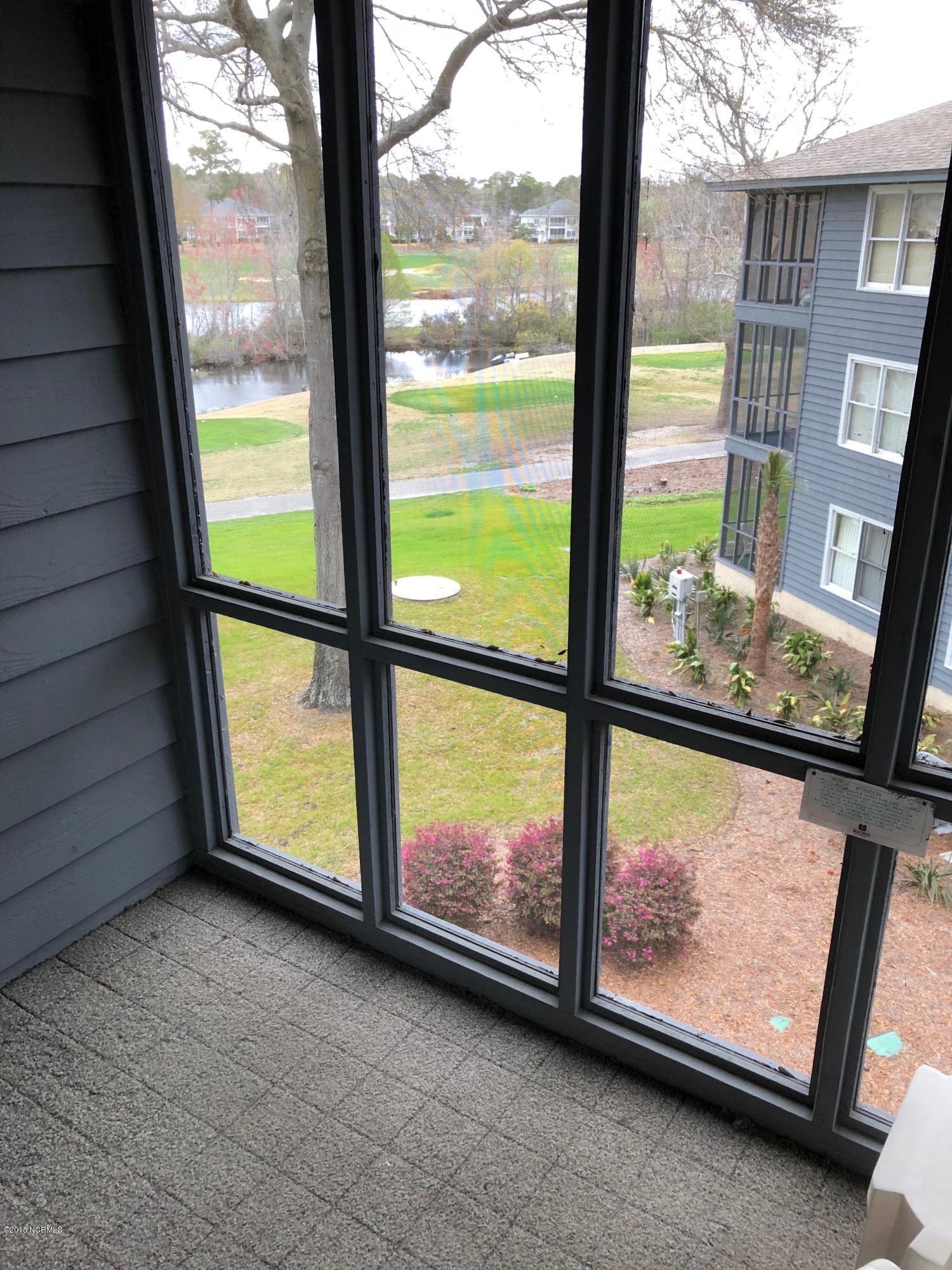 215 Clubhouse Road, Unit 206 Sunset Beach, NC 28468 - Photo 29 of 29 Mini Suite Screened in Porch