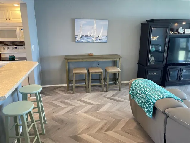 a workspace with furniture and a porch