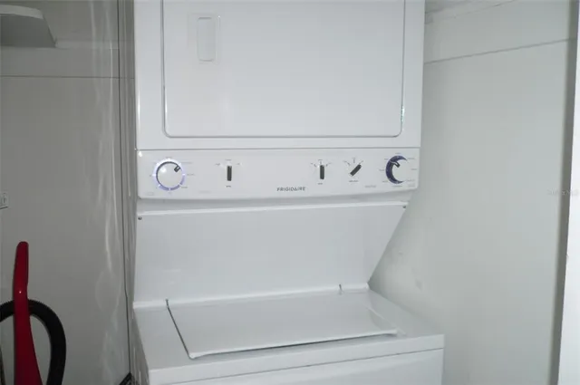 a view of a glass door and the balcony