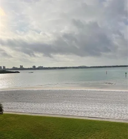 a view of ocean with sunset