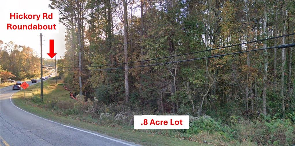 557 Hickory Road Canton, GA 30115 - Photo 9 of 10 a sign that is on the side of a road