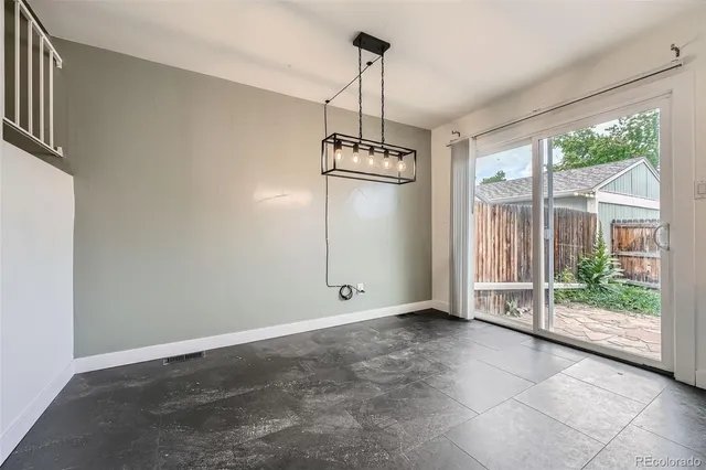 a view of a room with windows