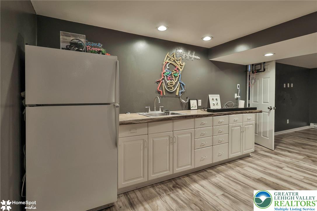 5832 Kernsville Road Orefield, PA 18069 - Photo 26 of 49 An inviting wet bar setup anchors this versatile lower level space.