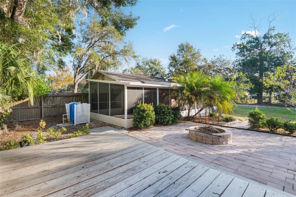 10620 Fawn Drive New Port Richey, FL 34654 - Photo 35 of 49 a front view of a house with sitting area and garden