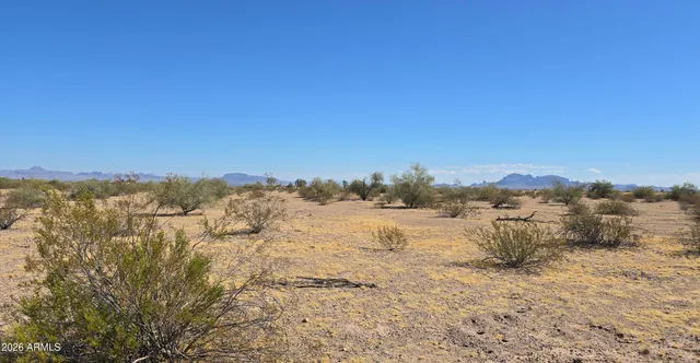 a view of mountain view with mountains in the background