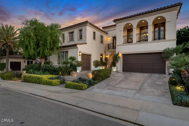a view of a house with outdoor space and swimming pool