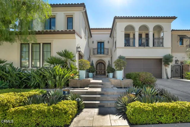 a view of living room with furniture and wooden floor
