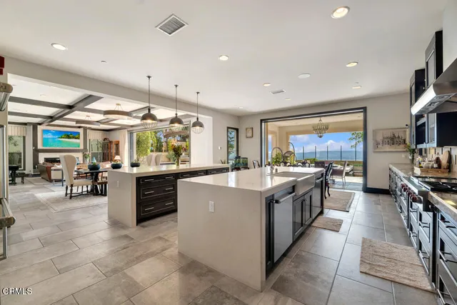a outdoor dining space with furniture and outdoor view