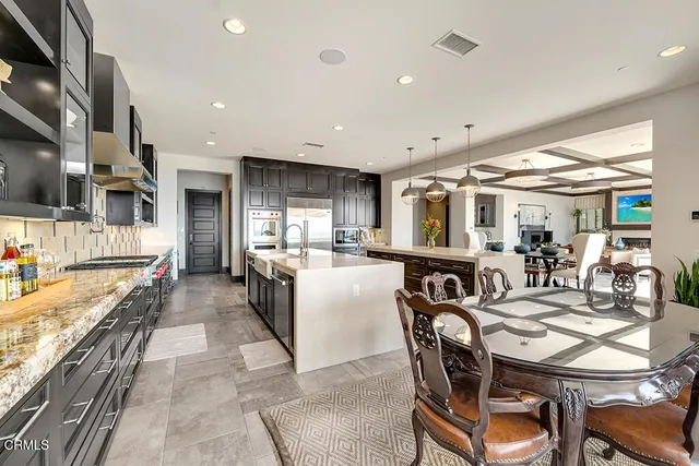 a view of a patio with swimming pool table and chairs