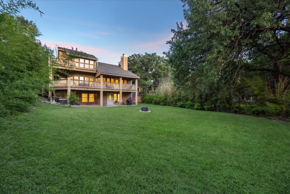 602 Jessie Street Austin, TX 78704 - Photo 32 of 32 a front view of a house with a yard