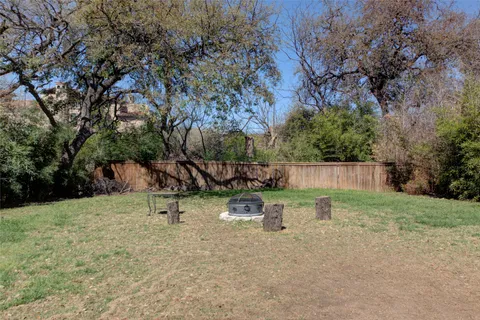 a view of backyard with green space