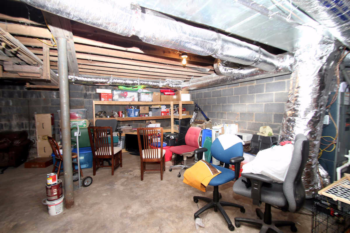 1005 Morrell Road Knoxville, TN 37919 - Photo 22 of 30 Unfinished Basement Storage