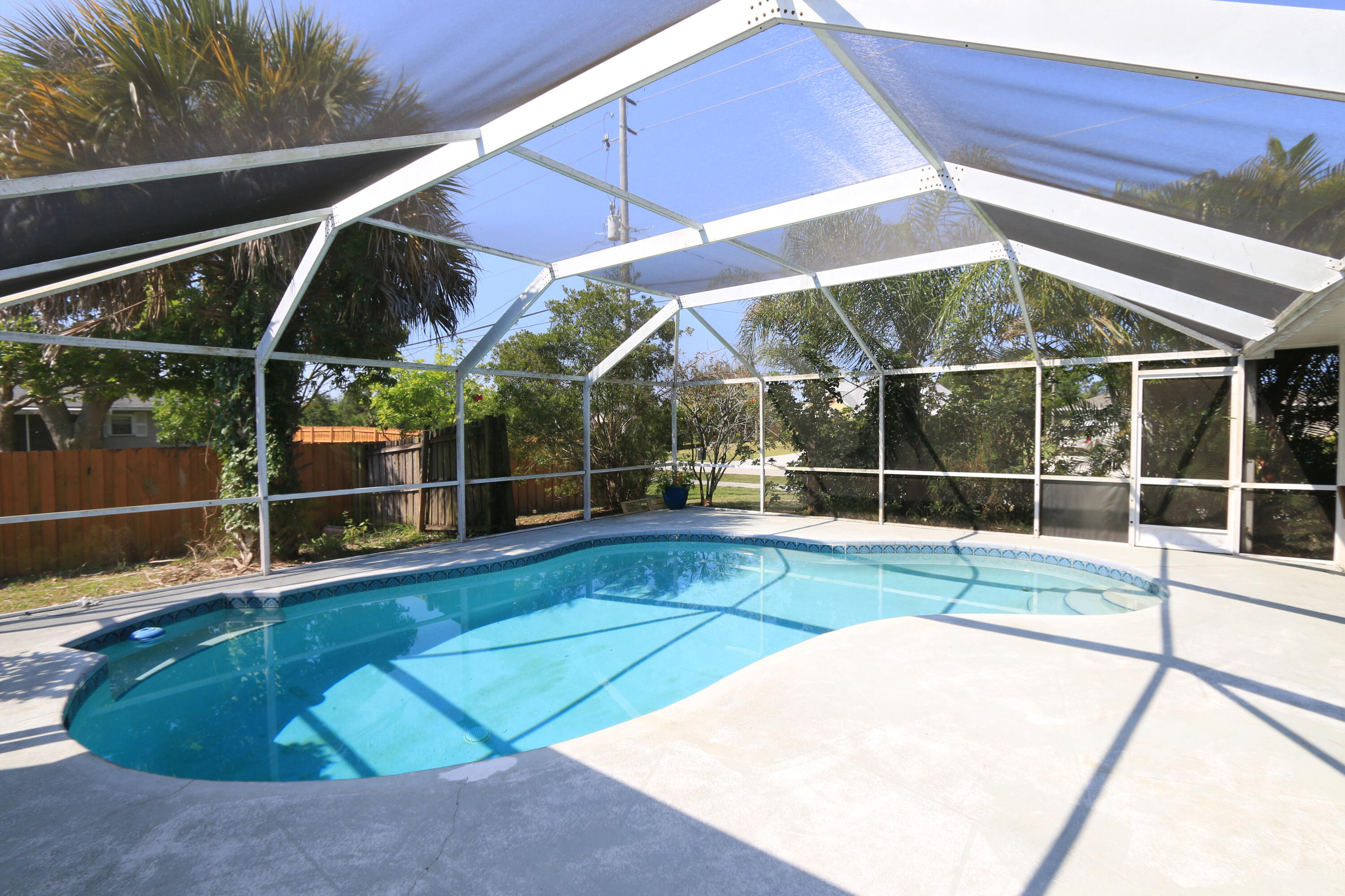 786 Southwest Bond Road Port St. Lucie, FL 34953 - Photo 1 of 33 a view of outdoor space with swimming pool