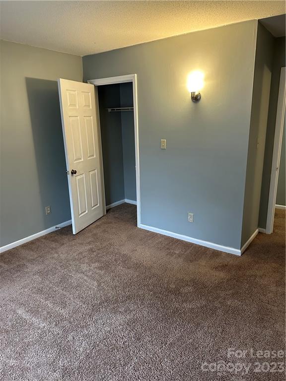 2106 South Main Street Kannapolis, NC 28081 - Photo 25 of 38 an empty room with windows