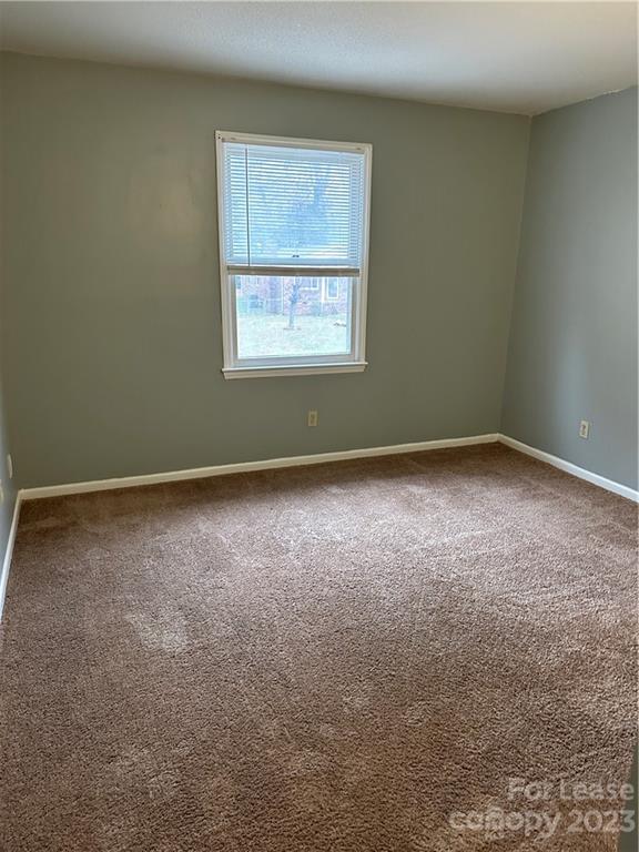 2106 South Main Street Kannapolis, NC 28081 - Photo 27 of 38 an empty room with a window