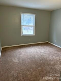 2106 South Main Street Kannapolis, NC 28081 - Photo 28 of 38 an empty room with a window