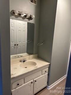 2106 South Main Street Kannapolis, NC 28081 - Photo 32 of 38 a bathroom with a sink and a mirror