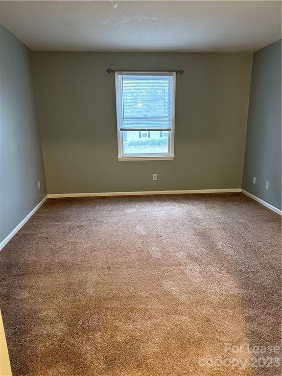 2106 South Main Street Kannapolis, NC 28081 - Photo 33 of 38 an empty room with windows