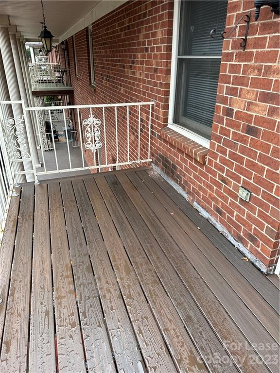 2106 South Main Street Kannapolis, NC 28081 - Photo 5 of 38 a view of wooden balcony