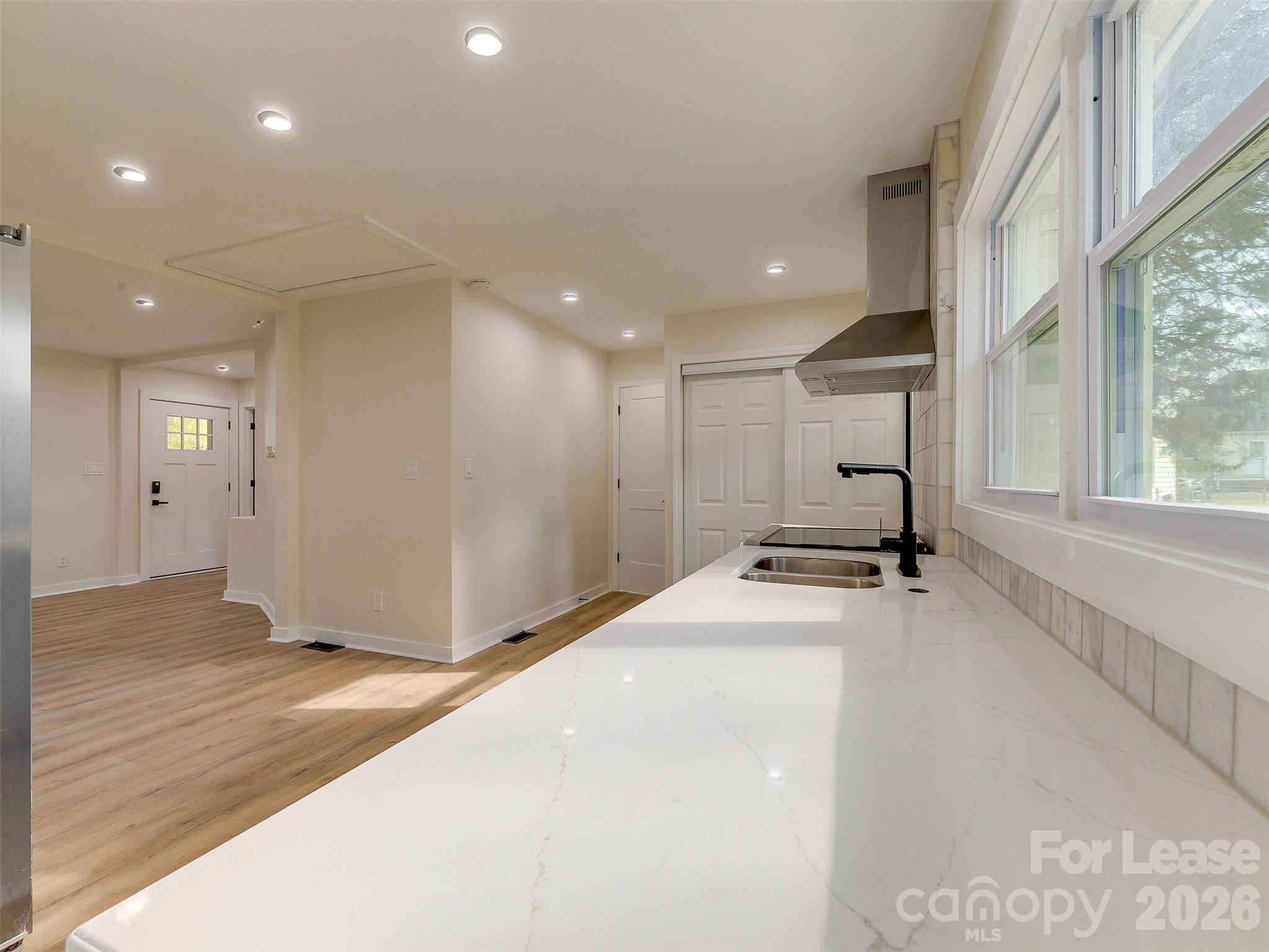 2721 Mayflower Road Charlotte, NC 28208 - Photo 20 of 42 a view of a livingroom with a hall and a window