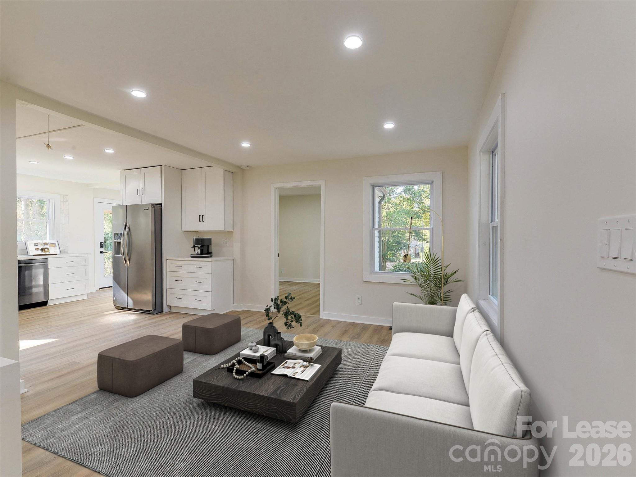 2721 Mayflower Road Charlotte, NC 28208 - Photo 7 of 42 a living room with furniture and a large window
