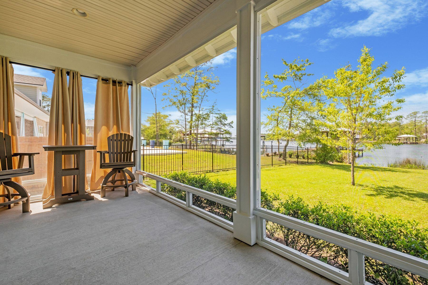 716 Bay Grove Road Freeport, FL 32439 - Photo 23 of 46 a view of an ocean from a balcony