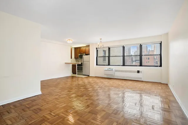 a picture of a bench in a white building