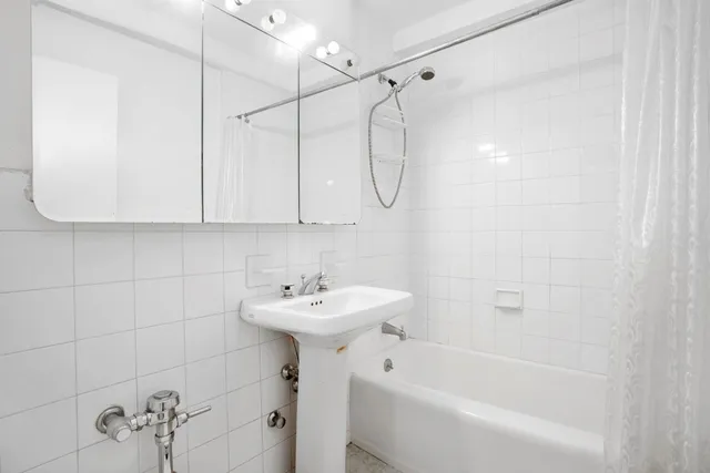 a view of a livingroom with a staircase