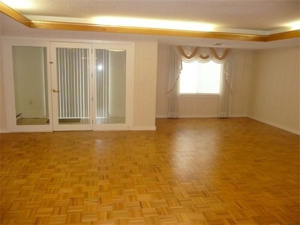 166 Place Lane, Unit 166 Woburn, MA 01801 - Photo 8 of 26 a view of a room has a window